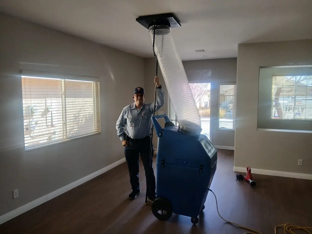 Professional Dryer Vent Cleaning work inside a Palm Desert home